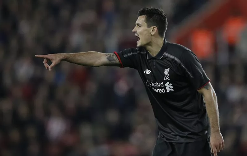 Liverpool's Croatian defender Dejan Lovren gestures to teammates during the English League Cup quarter-final football match between Southampton and Liverpool at St Mary's Stadium in Southampton, southern England on December 2, 2015.   AFP PHOTO / ADRIAN DENNIS

RESTRICTED TO EDITORIAL USE. No use with unauthorized audio, video, data, fixture lists, club/league logos or 'live' services. Online in-match use limited to 75 images, no video emulation. No use in betting, games or single club/league/player publications. / AFP / ADRIAN DENNIS