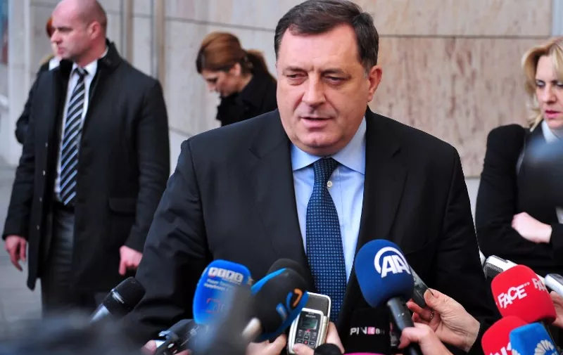Bosnian Serb political leader, Milorad Dodik speaks to journalists prior to multilateral meeting in Sarajevo, on January 17, 2014. The meeting is organised by EU Enlargement Commissioner, Stefan Fuele in order to meet influential Bosnian political leaders and reiterate the necessity for local politicians to reach agreements on the most important subjects including some constitutional changes aimed at unblocking the process of Bosnia's accession towards EU.  AFP PHOTO ELVIS BARUKCIC / AFP / ELVIS BARUKCIC