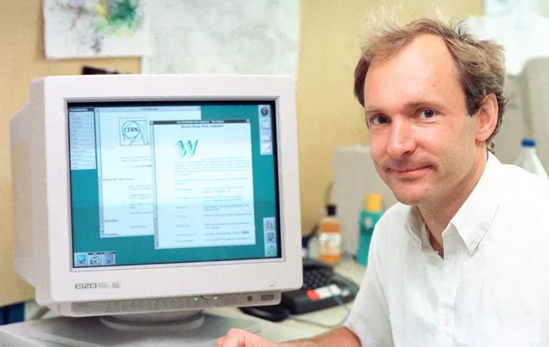 Tim Berners-Lee (born 1955), British physicist and computer scientist, with an early form of the websites and web browsers that he invented at CERN. Berners-Lee studied at Oxford University. After working in industry he moved to CERN (the European particle physics laboratory) near Geneva, Switzerland. Between 1989 and 1994, working at CERN, he developed the web, a global network for information sharing based on hypertext documents. In 1994, Berners-Lee founded the Web Consortium W3C, the International Web standards body of which he is the director. Berners-Lee was knighted in 2004. Photographed at CERN on 11 July 1994., Image: 242697232, License: Rights-managed, Restrictions: Editorial use only. This image may not be used to state or imply endorsement by CERN of any product, activity or service, Model Release: no, Credit line: Profimedia, Sciencephoto RM