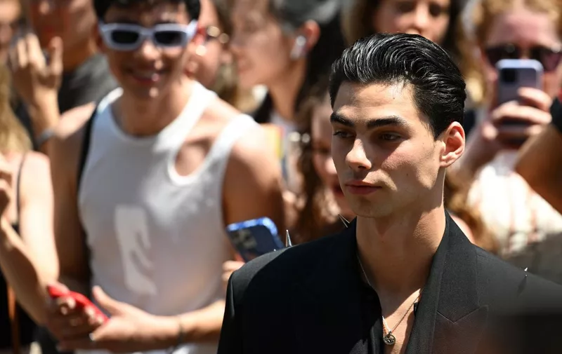 TikTok Star Jacob Rott arrives to attend Valentino's Men's Spring - Summer 2023 fashion show on June 16, 2023 as part of the Fashion Week in Milan. (Photo by Andreas SOLARO / AFP)