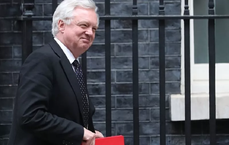 (FILES) This June 12, 2018 file photo shows Britain's Secretary of State for Exiting the European Union (Brexit Minister) David Davis leaving 10 Downing Street in central London after attending the weekly cabinet meeting. 
Britain's Brexit minister David Davis has resigned two days after the cabinet approved a plan to keep strong economic ties with the European Union after leaving the bloc, British media reported on Sunday, July 8, 2018. Davis, who was appointed two years ago to head up the newly-created Department for Exiting the European Union, had reportedly threatened to quit several times over Prime Minister Theresa May's stance in Brexit talks.  / AFP PHOTO / Daniel LEAL-OLIVAS