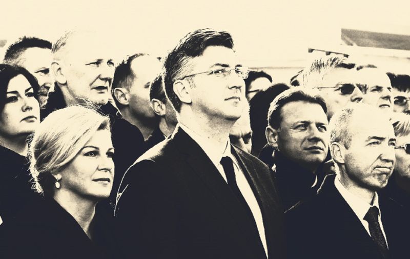 VUKOVAR, CROATIA - NOVEMBER 18: Croatian President Kolinda Grabar Kitarovic, Speaker of the Croatian Parliament, Bozo Petrov and Croatian Prime Minister Andrej Plenkovic march from Vukovar State hospital, where the injured people received treatment during the war, to the mausoleum during a commemoration ceremony on the 25th anniversary of the Vukovar massacre in Vukovar, Croatia on November 18, 2016. The Vukovar massacre was the killing of Croatian prisoners of war and civilians by Serb paramilitaries and the Yugoslav People's Army (JNA) at the Ovcara farm southeast of Vukovar on 20 November 1991, during the Croatian War of Independence. Mustafa Ozturk / Anadolu Agency, Image: 306063421, License: Rights-managed, Restrictions: , Model Release: no, Credit line: Profimedia, Abaca