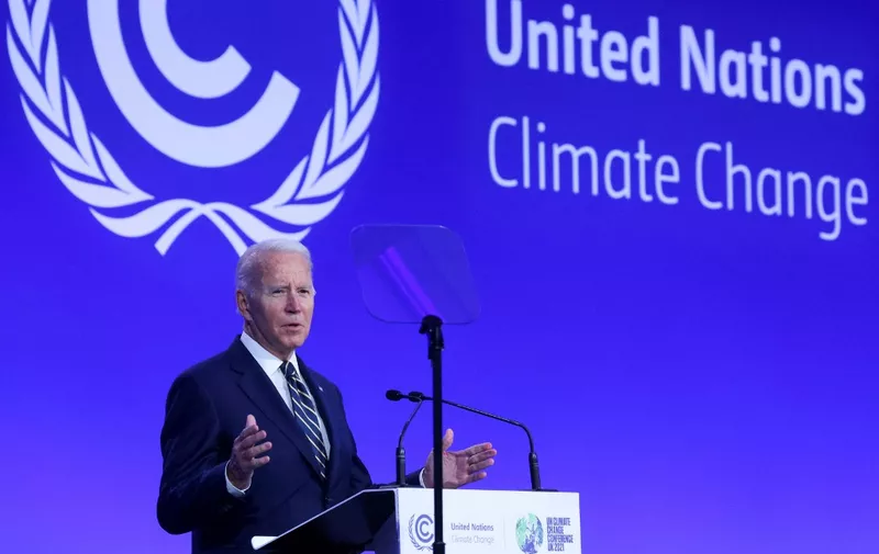 US President Joe Biden presents his national statement as part of the World Leaders' Summit of the COP26 UN Climate Change Conference in Glasgow, Scotland on November 1, 2021. - COP26, running from October 31 to November 12 in Glasgow will be the biggest climate conference since the 2015 Paris summit and is seen as crucial in setting worldwide emission targets to slow global warming, as well as firming up other key commitments. (Photo by YVES HERMAN / POOL / AFP)