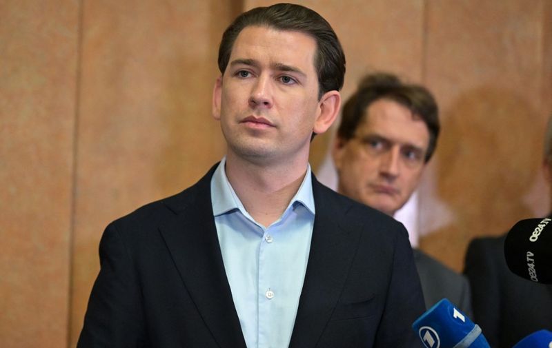 Austria's former Chancellor Sebastian Kurz speaks to journalists as he leaves the court after his trial at the Regional Criminal Court of Vienna, Austria, on February 23, 2024, where his verdict has announced following a months-long trial for alleged false testimony. The Austrian court on February 23, 2024 ruled on the case of former chancellor Sebastian Kurz, once hailed as a "wunderkind" of Europe's conservatives. Kurz has insisted he is innocent of having given false testimony to an inquiry probing wide-ranging corruption scandals that brought down his first government with the far-right in 2019. (Photo by Joe Klamar / AFP)