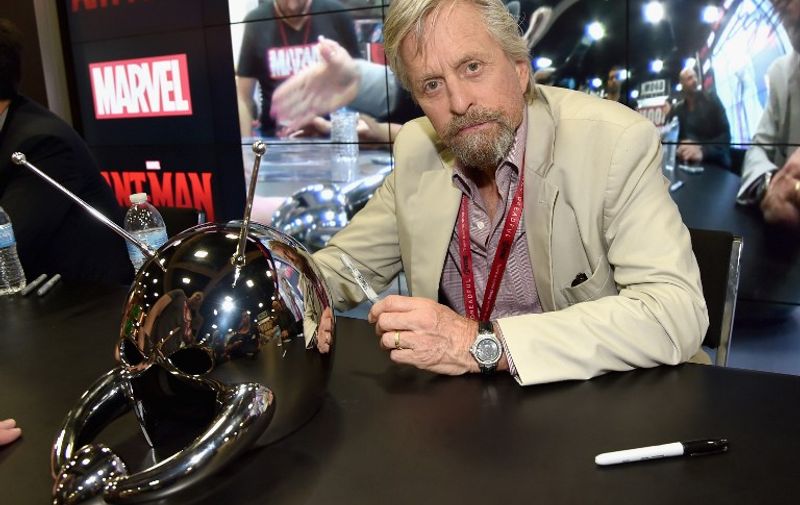 SAN DIEGO, CA - JULY 26: Actor Michael Douglas attends Marvel's "Ant-Man" Hall H Panel Booth Signing during Comic-Con International 2014 at San Diego Convention Center on July 26, 2014 in San Diego, California.   Alberto E. Rodriguez/Getty Images for Disney/AFP