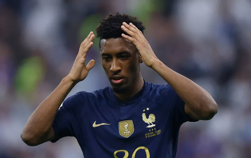 Soccer Football - FIFA World Cup Qatar 2022 - Final - Argentina v France - Lusail Stadium, Lusail, Qatar - December 18, 2022  France's Kingsley Coman looks dejected after missing a penalty during the penalty shootout REUTERS/Hannah Mckay