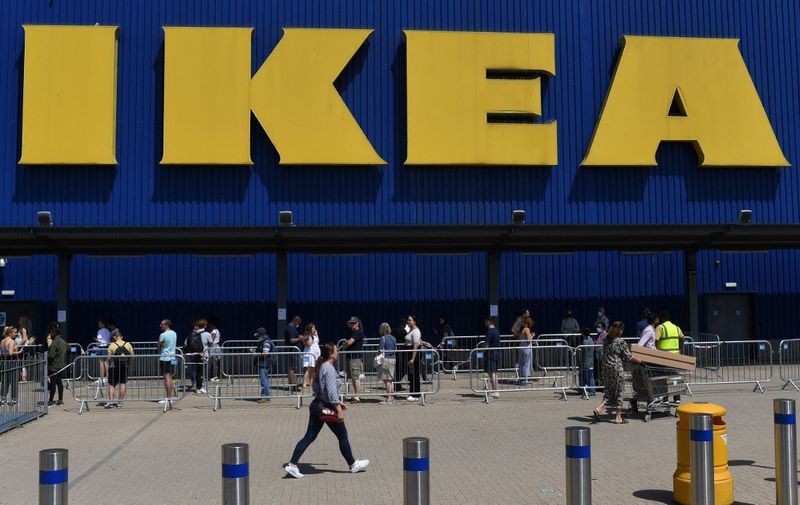 Members of the public queue outside an Ikea store at Wembley in north-west London as it re-opens its doors following the easing of the lockdown restrictions during the novel coronavirus COVID-19 pandemic on June 1, 2020. - Some non-essential stores, car dealerships and outdoor markets in Britain on June 1 were able to reopen from their COVID-19 shutdown in an easing of coronavirus lockdown measures. (Photo by Daniel LEAL / AFP)