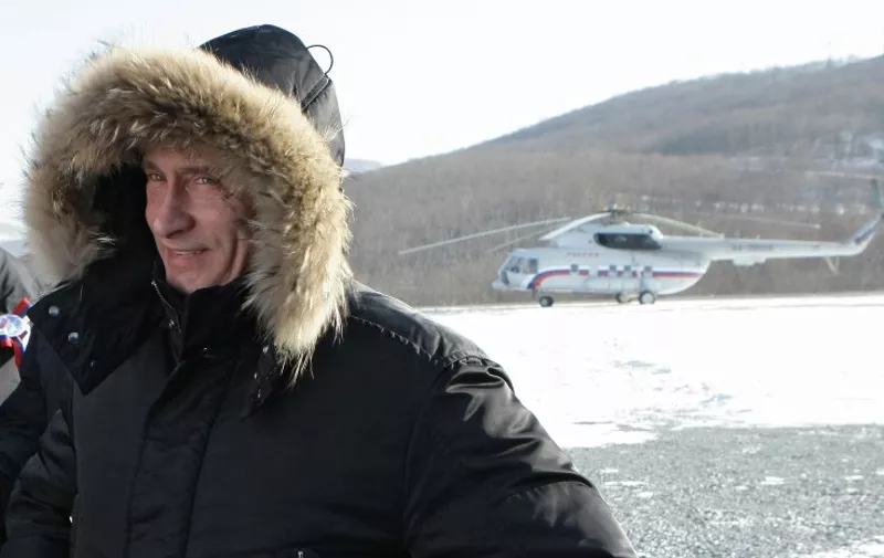 Clad in a heavy winter parka, Russian Prime Minister Vladimir Putin smiles upon his arrival in Kozmino to take part in a ceremony of commissioning the East Siberia - Pacific Ocean Oil Pipeline in Russia's Far East on December 28, 2009. Russia has surpassed Saudi Arabia as the world's top world oil exporter due to output quota cuts by the oil cartel OPEC and to new oil fields in Siberia coming on line.
AFP PHOTO / RIA NOVOSTI / POOL / ALEXEY NIKOLSKY / AFP / RIA NOVOSTI / ALEXEY NIKOLSKY