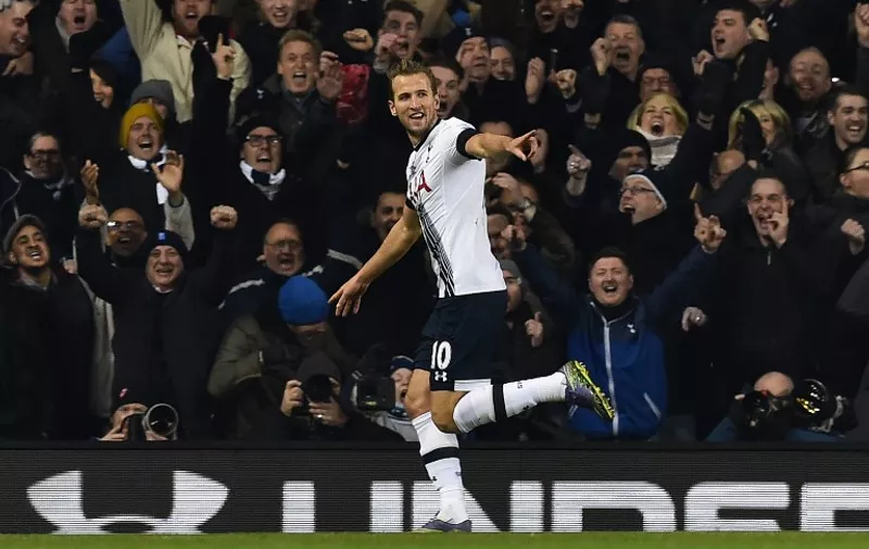 Tottenham Hotspur's English striker Harry Kane celebrates after scoring the opening goal of the English Premier League football match between Tottenham Hotspur and West Ham United at White Hart Lane in north London on November 22, 2015. AFP PHOTO / BEN STANSALL

RESTRICTED TO EDITORIAL USE. No use with unauthorized audio, video, data, fixture lists, club/league logos or 'live' services. Online in-match use limited to 75 images, no video emulation. No use in betting, games or single club/league/player publications. / AFP / BEN STANSALL