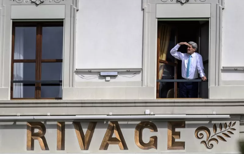 -- AFP PICTURES OF THE YEAR 2015 --
US Secretary of State John Kerry looks out of the window of his room at the Beau-Rivage Palace hotel during a break in Iran nuclear talks in Lausanne, Switzerland, on April 1, 2015. Iran's chief nuclear negotiator Abbas Araghchi said on April 1 that "problems" remain in nuclear talks with world powers and that there can be no deal without a "framework for the removal of all sanctions". AFP PHOTO / FABRICE COFFRINI / AFP / FABRICE COFFRINI