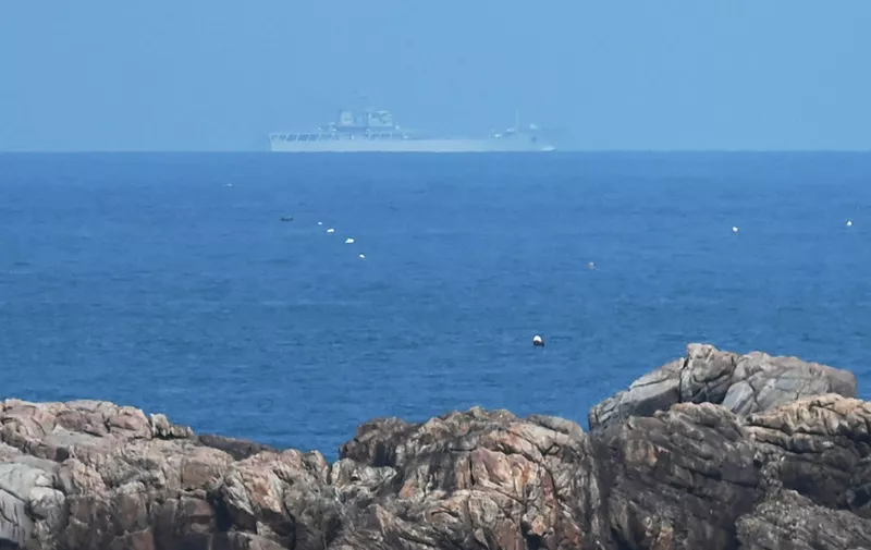 A PLA Navy landing ship sails towards the zone where China said it would conduct live fire exercises northeast of Pingtan island, the closest point in China to Taiwan, in Chinas southeast Fujian province on April 10, 2023. (Photo by GREG BAKER / AFP)