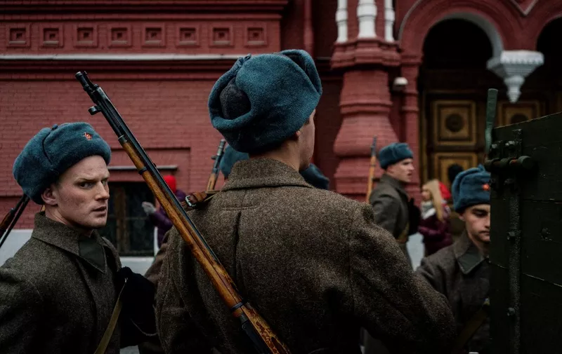 Russian servicemen dressed in historical take part in the military parade at Red Square in Moscow on November 7, 2019, as part of the ceremonies marking the 78th anniversary of the 1941 historical parade, when Red Army soldiers marched past the Kremlin walls towards the front line to fight Nazi Germany troops during World War II. (Photo by Dimitar DILKOFF / AFP)