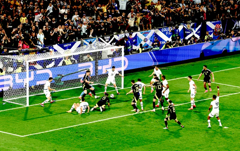 Soccer Football - Euro 2024 - Group A - Scotland v Switzerland - Cologne Stadium, Cologne, Germany - June 19, 2024
Switzerland's Michel Aebischer in action with Scotland's Grant Hanley REUTERS/Thilo Schmuelgen