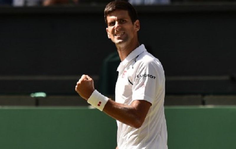 Serbia's Novak Djokovic reacts against France's Richard Gasquet during their men's semi-final match on day eleven of the 2015 Wimbledon Championships at The All England Tennis Club in Wimbledon, southwest London, on July 10, 2015.   RESTRICTED TO EDITORIAL USE  --   AFP PHOTO / LEON NEAL
