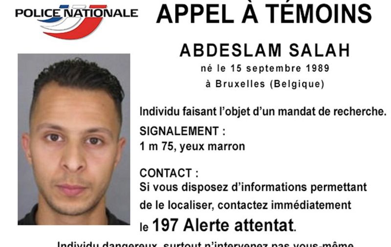 This handout image, "appel a temoins" (call for witnesses), released by the French Police information service (SICOP) on November 15, 2015 shows a picture and description of Abdeslam Salah, suspected of being involved in the attacks that occured on November 13, 2015 in Paris. Islamic State jihadists claimed a series of coordinated attacks by gunmen and suicide bombers in Paris on November 13 that killed at least 129 people in scenes of carnage at a concert hall, restaurants and the national stadium.   AFP PHOTO / POLICE NATIONALE
RESTRICTED TO EDITORIAL USE - MANDATORY CREDIT "AFP PHOTO / POLICE NATIONALE " - NO MARKETING NO ADVERTISING CAMPAIGNS - DISTRIBUTED AS A SERVICE TO CLIENTS / AFP / POLICE NATIONALE / DSK