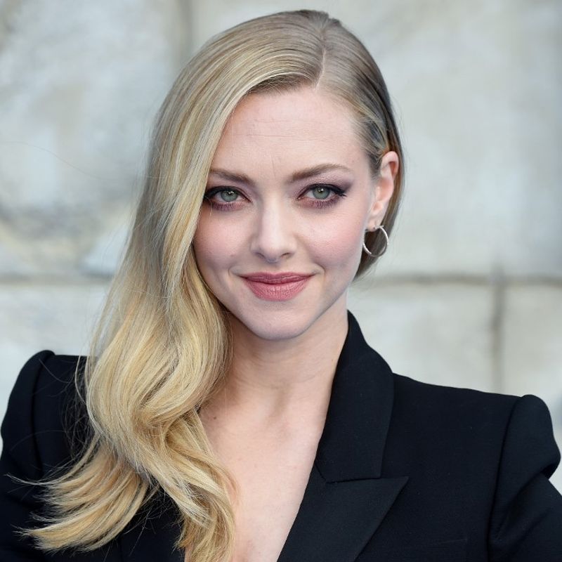 Amanda Seyfried poses on the red carpet upon arrival for the world premiere of the film "Mamma Mia! Here We Go Again" in London on July 16, 2018. (Photo by Anthony HARVEY / AFP)