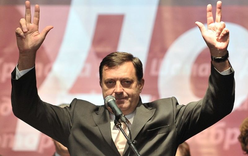 Milorad Dodik, President of the "Union of Independant Social Democrates" (SNSD) gestures to the supporters after his speech during pre-elecion rally, in Northern-Bosnian city of Doboj, on September 29, 2010. SNSD party presented their candidates in the upcoming elections for Bosnia's tripartite Presidency and National Assembly. National elections in Bosnia and Herzegovina are scheduled for October 3, 2010. AFP PHOTO ELVIS BARUKCIC