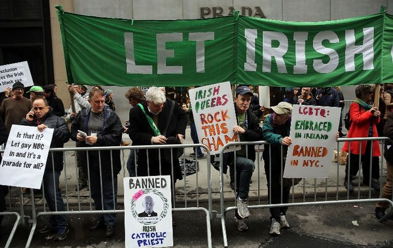 NEW YORK, NY - MARCH 17: Irish gay rights activists and supporters protest against the exclusion of Irish gay groups from marching in the St. Patrick's Day Parade as it makes its way up 5th Avenue on March 17, 2015 in New York City. Despite a policy shift that will allow NBCUniversal's gay employee group to march for the first time in the parade's history, New York Mayor Bill de Blasio has refused to march in the city's parade. Tuesday's parade saw that group, OUT@NBCUniversal, marching under its own banner.   Spencer Platt/Getty Images/AFP