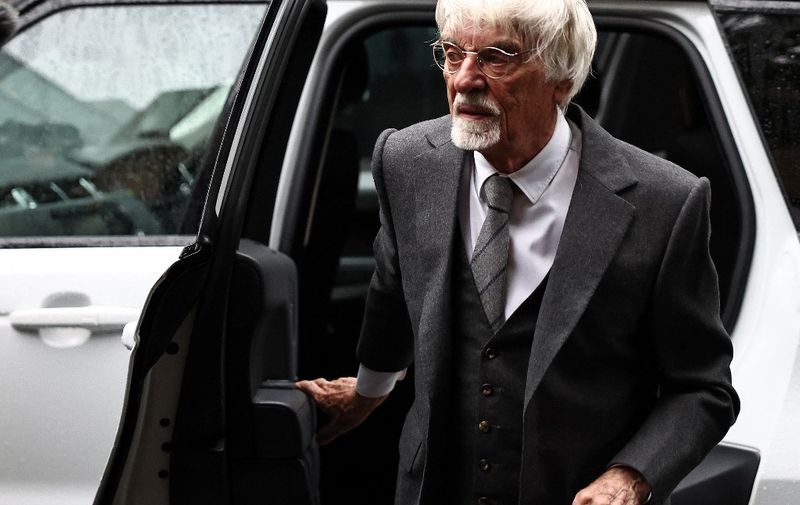Ex-Formula One chief Bernie Ecclestone arrives at Southwark Crown Court in central London, on October 12, 2023. Former Formula One supremo Bernie Ecclestone is facing a claim of fraud over an alleged failure to declare £400 million ($477 million, 473 million euros) of overseas assets to the British government. (Photo by HENRY NICHOLLS / AFP)