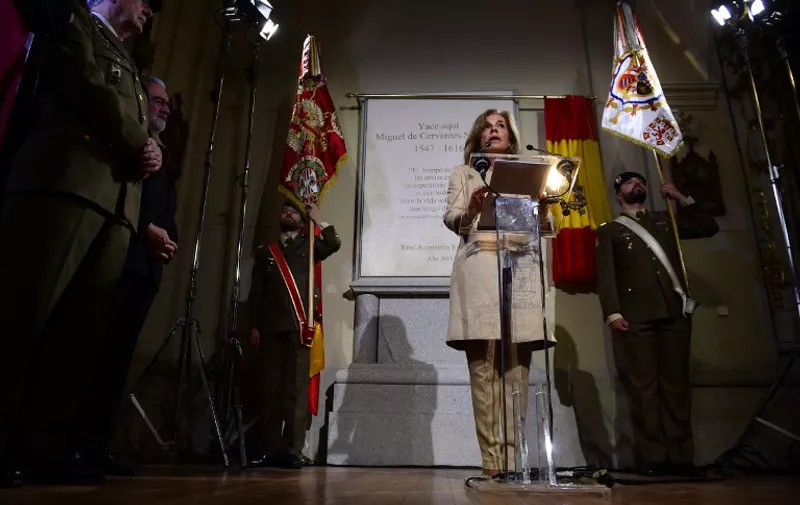 Current mayor of Madrid conservative Ana Botella speaks in the crypt of Trinitarias church in Madrid on June 11, 2015 after inaugurating a memorial plaque marking the place where Spanish writer Miguel de Cervantes' remains were found. The "Don Quixote" author's remains were unearthed in Madrid on March 17, 2015, nearly 400 years after his death in 1616, a week after William Shakespeare. AFP PHOTO / PIERRE-PHILIPPE MARCOU
