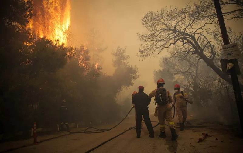 July 23, 2018 - Athens, Greece - A forest fire burns in a mountainous area west of Athens, sending nearby residents fleeing. The fire department said five water-dropping planes and two helicopters were battling the blaze Monday in the Geraneia mountains near the seaside settlement of Kineta between Athens and Corinth, along with 30 firetrucks and 70 firefighters., Image: 379130085, License: Rights-managed, Restrictions: , Model Release: no, Credit line: Profimedia, Zuma Press - News
