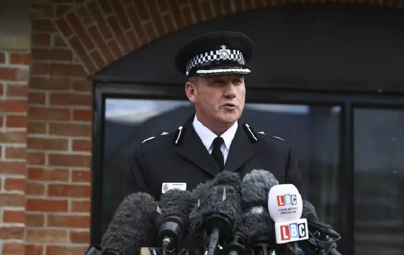 Deputy Chief Constable Paul Mills give a statement to the media outside the Bowman Centre in Amesbury, north of Salisbury, southern England, on July 4, 2018. 
Two people have been hospitalised in a critical condition for exposure to an "unknown substance" in the same British city where former Russian spy Sergei Skripal and his daughter were poisoned with a nerve agent earlier this year. British police declared a "major incident" after the couple, a man and a woman in their 40s, were discovered unconscious at a house in a quiet, newly-built area in Amesbury.
 / AFP PHOTO / Geoff CADDICK