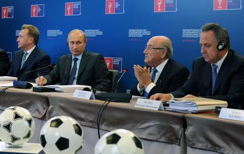 FIFA President Sepp Blatter (2nd R) speaks on October 28, 2014 as Russian President Vladimir Putin (2nd L), First Vice Premier Igor Shuvalov (L) and Sports Minister Vitaly Mutko attend a council "Russia 2018"  in Moscow. Blatter on October 28  opposed any boycott of the 2018 World Cup in Russia and backed the huge preparations undertaken by Putin's government for the event. AFP PHOTO /  