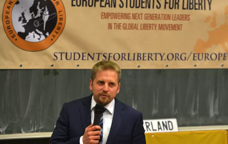 TO GO WITH AFP STORY BY JAN FLEMR-
Vit Jedlicka, a 31-year-old Czech liberal politician presents his  ''Liberland'' on April 20, 2015 at the University of Economics in Prague. Jedlicka founded Liberland, a tiny tax haven, on a piece of no-man's land between Croatia and Serbia earlier this month. The newest country on the world map offers voluntary taxes to new citizens who respect other people and their views, respect private property, have no criminal record and have no record as Communists, Nazis or other extremists.   AFP PHOTO/MICHAL CIZEK
