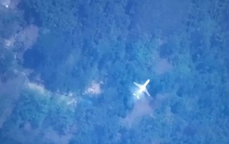 A satellite image provided by Tomnod, the online map site used by millions of netizens in the search for the missing Malaysia Airlines flight MH370, shows a passenger plane on an unidentified jungle. The image is searched by an applied science student from the Nan Kai University of Technology in Taiwan on March 18, 2014, according to Taiwan's China Times. The image, map number Map654342, has been sent to Tomnod to get location information. (EyePress/Tomnod)