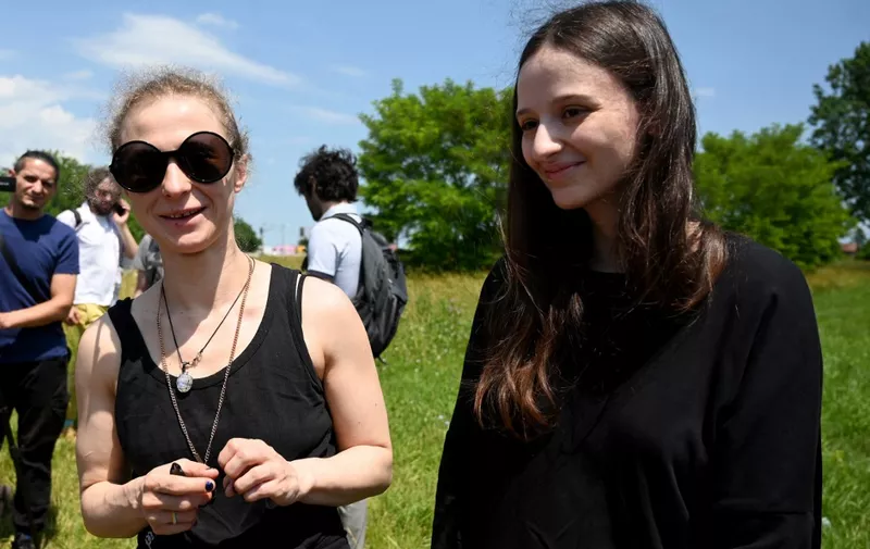 Russian activist and Pussy Riot member Maria Alikhina (L) and Pussy Riot member Lucy Stein (R) attend a press conference in front of Zagreb Prison on June 1, 2022, to protest against Pussy Riot member Aisoltan Niyazova's custody in Croatia. (Photo by DENIS LOVROVIC / AFP) / The erroneous mention[s] appearing in the metadata of this photo by DENIS LOVROVIC has been modified in AFP systems in the following manner: [Pussy Riot member Lucy Stein] instead of [Aisoltan Niyazova's daughter Lucy Stein ]. Please immediately remove the erroneous mention[s] from all your online services and delete it (them) from your servers. If you have been authorized by AFP to distribute it (them) to third parties, please ensure that the same actions are carried out by them. Failure to promptly comply with these instructions will entail liability on your part for any continued or post notification usage. Therefore we thank you very much for all your attention and prompt action. We are sorry for the inconvenience this notification may cause and remain at your disposal for any further information you may require.