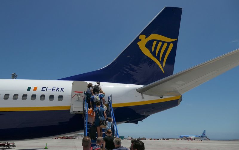 Passengers boarding Ryanair low cost airline aircraft for a flight to central Europe , on Tenerife South Airport Reina Sofia Airport TFS GCTS or Aeropuerto de Tenerife Sur in Tenerife Island, Canary Islands, Spain on May 19, 2019. The aircraft registration is EI-EKK, Ryan Air RYR FR is an irish loc cost airline and one of the largest budget airlines in the world. The airline connects Tenerife to various European destination on scheduled or seasonal summer flights as people fly for holidays, trips, vacations.
Passengers Boarding Ryanair, Tenerife, Spain - 19 May 2019,Image: 627891254, License: Rights-managed, Restrictions: , Model Release: no, Credit line: Profimedia