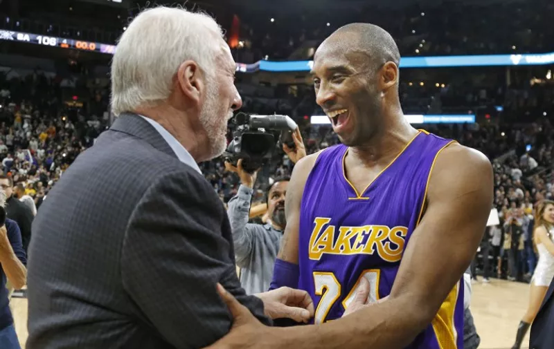 SAN ANTONIO,TX - FEBRUARY 6: Kobe Bryant #24 of the Los Angeles Lakers shares a light moment with San Antonio Spurs head coach Gregg Popovich at AT&amp;T Center on February 6, 2016 in San Antonio, Texas. NOTE TO USER: User expressly acknowledges and agrees that , by downloading and or using this photograph, User is consenting to the terms and conditions of the Getty Images License Agreement.   Ronald Cortes/Getty Images/AFP
