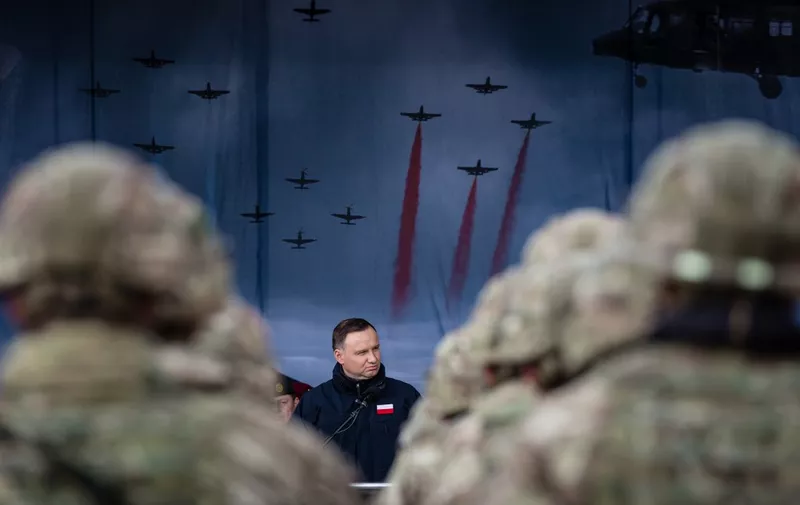 Polish President Andrzej Duda speaks during an official welcoming ceremony of NATO troops in Orzysz, Poland, on April 13, 2017. - The batallion is one of four NATO is deploying for the first time to Poland and the Baltic states as tripwires against Russian adventurism on its eastern flank, a region formerly under Moscow's control and spooked by its actions in Ukraine. (Photo by Wojtek RADWANSKI / AFP) / The erroneous mention[s] appearing in the metadata of this photo by Wojtek RADWANSKI has been modified in AFP systems in the following manner: [Orzysz] instead of [Warsaw]. Please immediately remove the erroneous mention[s] from all your online services and delete it (them) from your servers. If you have been authorized by AFP to distribute it (them) to third parties, please ensure that the same actions are carried out by them. Failure to promptly comply with these instructions will entail liability on your part for any continued or post notification usage. Therefore we thank you very much for all your attention and prompt action. We are sorry for the inconvenience this notification may cause and remain at your disposal for any further information you may require.