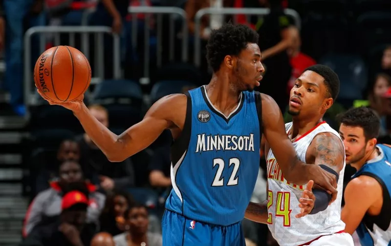 ATLANTA, GA - NOVEMBER 09: Kent Bazemore #24 of the Atlanta Hawks defends against Andrew Wiggins #22 of the Minnesota Timberwolves at Philips Arena on November 9, 2015 in Atlanta, Georgia. NOTE TO USER User expressly acknowledges and agrees that, by downloading and or using this photograph, user is consenting to the terms and conditions of the Getty Images License Agreement.   Kevin C. Cox/Getty Images/AFP
