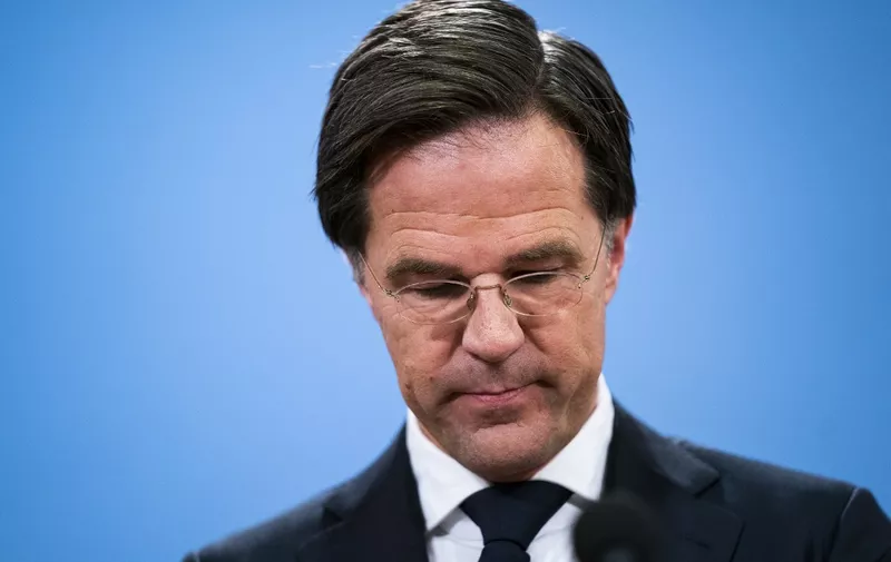 Dutch resigning Prime Minister Mark Rutte gives a press conference in The Hague, on January 15, 2021, after the resignation of the cabinet due to the childcare allowance affair, in which tax officials falsely accused thousands of parents of fraud and ordered them to repay childcare benefits. - Dutch Prime Minister Mark Rutte's government resigned on January 15 over a child benefits scandal, media reported, threatening political turmoil as the country battles the coronavirus pandemic. (Photo by Bart Maat / ANP / AFP) / Netherlands OUT