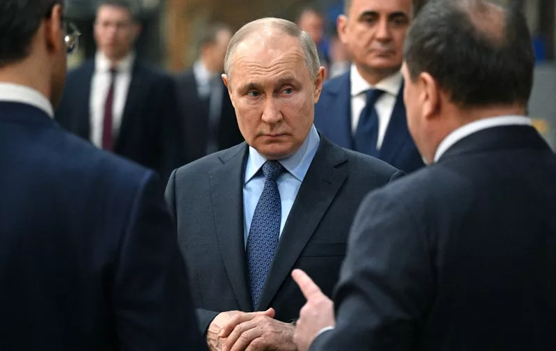 Russian President Vladimir Putin visits the Tulazheldormash plant, Russian leading machine-building enterprise, in Tula on April 4, 2023. (Photo by Ramil SITDIKOV / SPUTNIK / AFP)