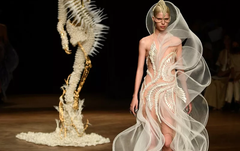 A model presents a creation by Dutch fashion designer Iris Van Herpen during the Women's Haute-Couture Fall - Winter 2023 Fashion Week in Paris on July 4, 2022. (Photo by Christophe ARCHAMBAULT / AFP)