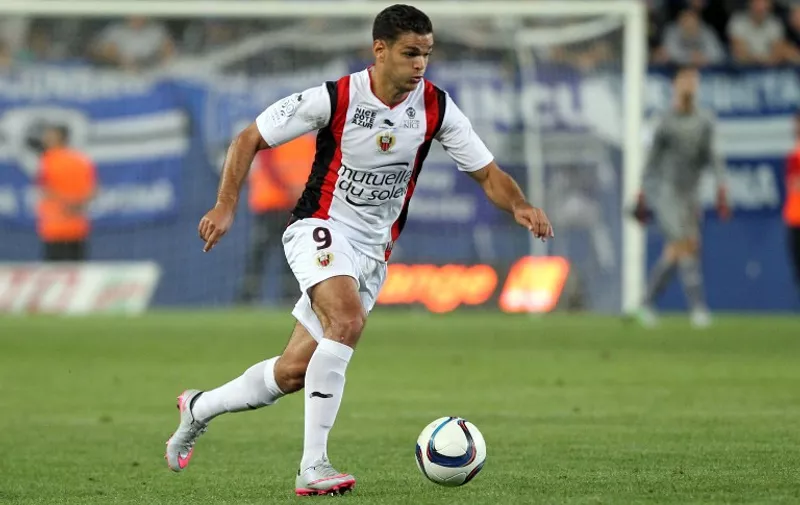 Nice's French forward Hatem Ben Arfa runs with the ball during the French L1 football match Bastia (SCB) against Nice (OGCN) on September 19, 2015 in the Armand Cesari stadium in Bastia, French Mediterranean island of Corsica. AFP PHOTO / PASCAL POCHARD-CASABIANCA