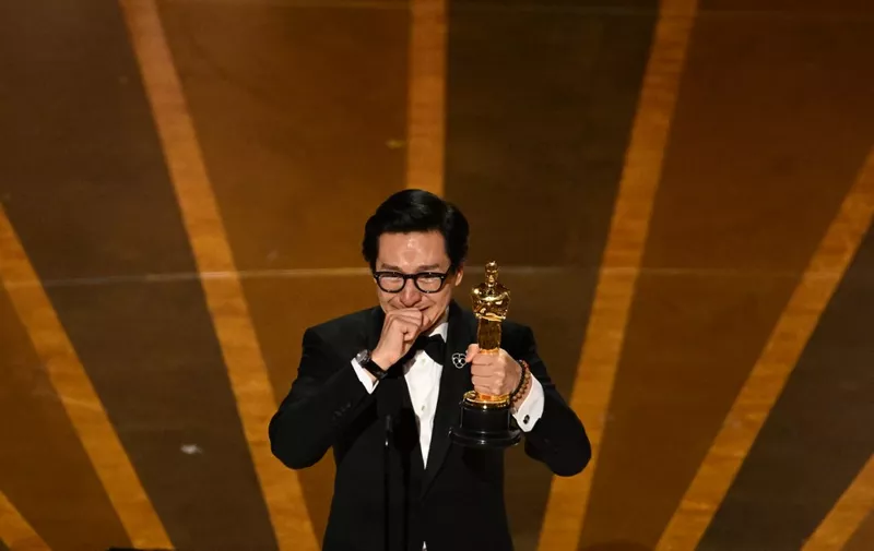 US-Vietnamese actor Ke Huy Quan accepts the Oscar for Best Actor in a Supporting Role for "Everything Everywhere All at Once" onstage during the 95th Annual Academy Awards at the Dolby Theatre in Hollywood, California on March 12, 2023. (Photo by )