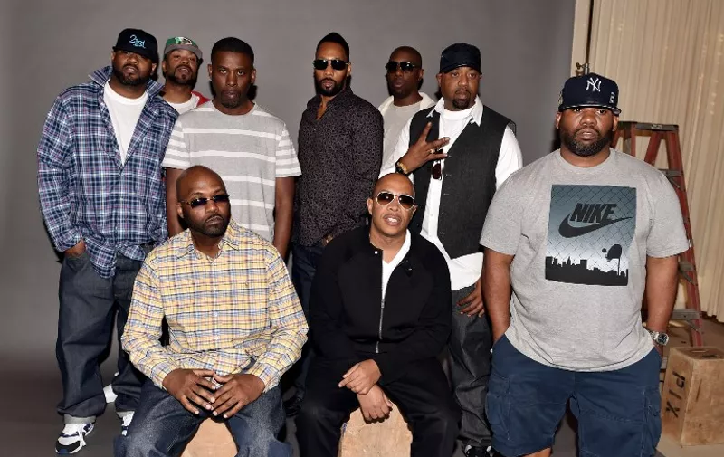 BURBANK, CA - OCTOBER 02: (L-R, standing) Rappers Ghostface Killah, Method Man, GZA, RZA, Inspectah Deck, Cappadonna, Raekwon, (L-R, seated), Masta Killa and U-God of the Wu-Tang Clan pose at a press conference to announce they have signed with Warner Bros. Records at Warner Bros. Records on October 2, 2014 in Burbank, California.   Kevin Winter/Getty Images/AFP