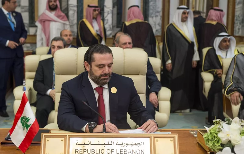This handout picture released by the Saudi Royal Palace on May 31, 2019 shows Lebanese Prime Minister Saad al-Hariri (C) attending the Arab summit meeting held in the Saudi holy city of Mecca. (Photo by Bandar AL-JALOUD / Saudi Royal Palace / AFP) / RESTRICTED TO EDITORIAL USE - MANDATORY CREDIT "AFP PHOTO /  SAUDI ROYAL PALACE / BANDAR AL-JALOUD " - NO MARKETING NO ADVERTISING CAMPAIGNS - DISTRIBUTED AS A SERVICE TO CLIENTS / The erroneous mention[s] appearing in the metadata of this photo by Bandar AL-JALOUD has been modified in AFP systems in the following manner: [Arab summit] instead of [Gulf Cooperation Council meeting]. Please immediately remove the erroneous mention[s] from all your online services and delete it (them) from your servers. If you have been authorized by AFP to distribute it (them) to third parties, please ensure that the same actions are carried out by them. Failure to promptly comply with these instructions will entail liability on your part for any continued or post notification usage. Therefore we thank you very much for all your attention and prompt action. We are sorry for the inconvenience this notification may cause and remain at your disposal for any further information you may require.
