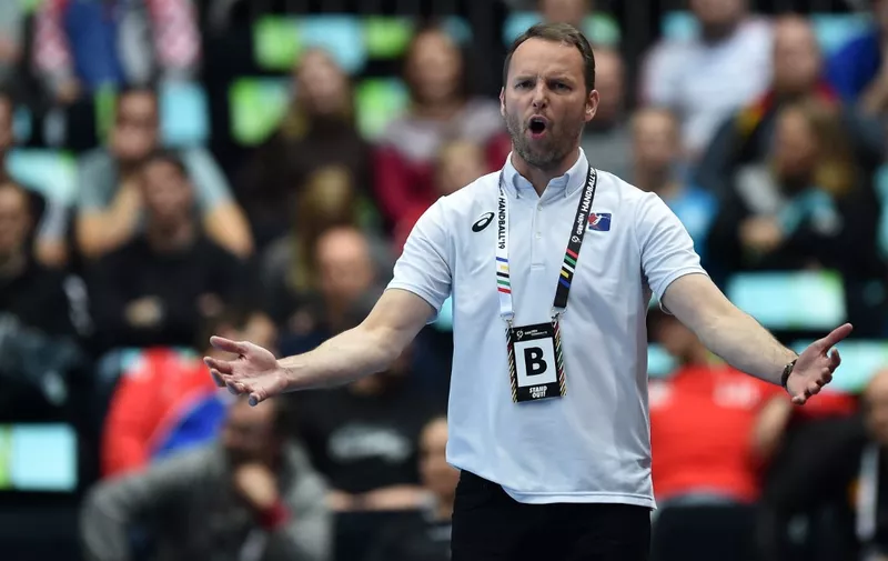 Japan's Icelandic coach Dagur Sigurdsson reacts during the IHF Men's World Championship 2019 Group B handball match between Bahrain and Japan at the Olympic hall in Munich, southern Germany, on January 17, 2019. (Photo by Christof STACHE / AFP)