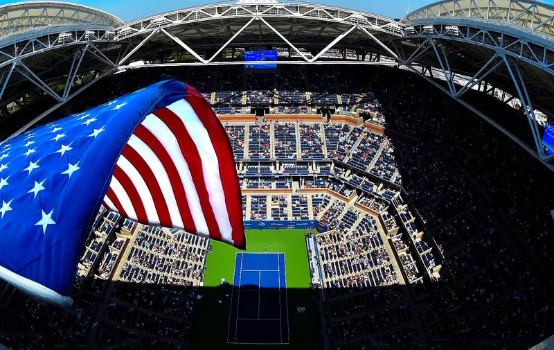 Sept 4, 2017; New York, NY, USA; A general view of the American flag over Ashe Stadium while Karolina Pliskova of the Czech Republic hits to Jennifer Brady of the USA on day eight of the U.S. Open tennis tournament in at the USTA Billie Jean King National Tennis Center., Image: 348309978, License: Rights-managed, Restrictions: [&hellip;]