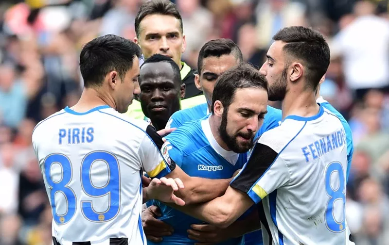 Napoli's forward from Argentina Gonzalo Higuain reacts after he received a red card during the Italian Serie A football match Udinese vs Napoli at Friuli Stadium in Udine on April 3, 2016. / AFP / GIUSEPPE CACACE