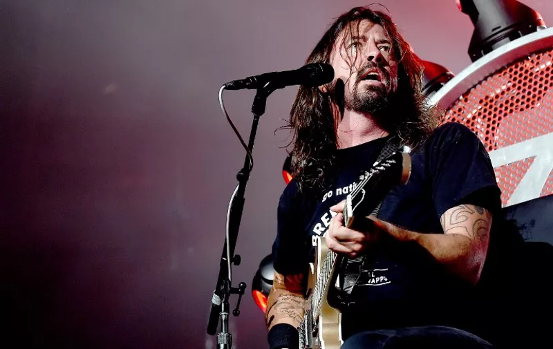 INGLEWOOD, CA - SEPTEMBER 22: Musician Dave Grohl of the Foo Fighters performs at the Forum on September 22, 2015 in Inglewood, California.   Kevin Winter/Getty Images/AFP