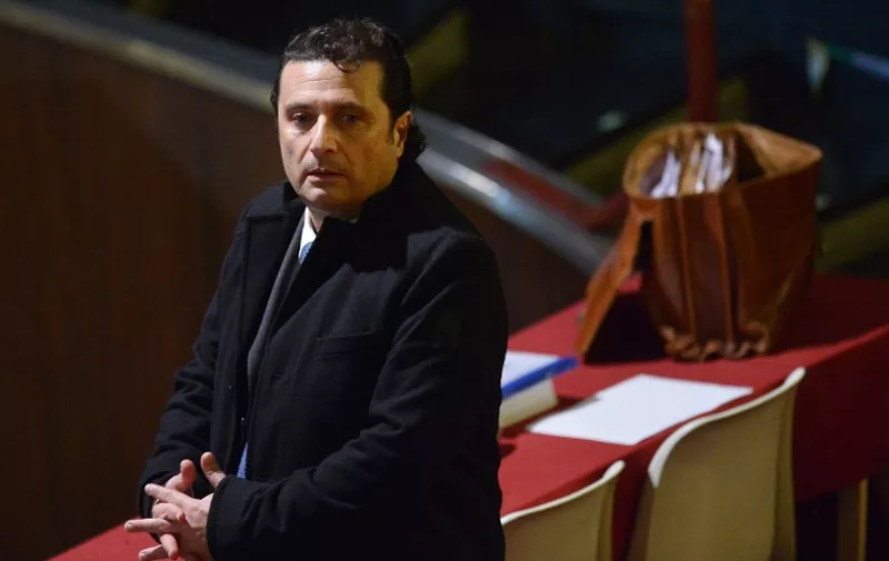 Costa Concordia's captain Francesco Schettino arrives for his trial on February 10, 2015 in Grosseto. An Italian court is expected to announce a verdict this week in the case against Francesco Schettino, the captain of the Costa Concordia cruise ship that capsized in 2012, killing 32 people. Schettino, 54, is charged with multiple manslaughter and causing a shipwreck. He is also accused of abandoning ship ahead of his passengers. AFP PHOTO / ALBERTO PIZZOLI