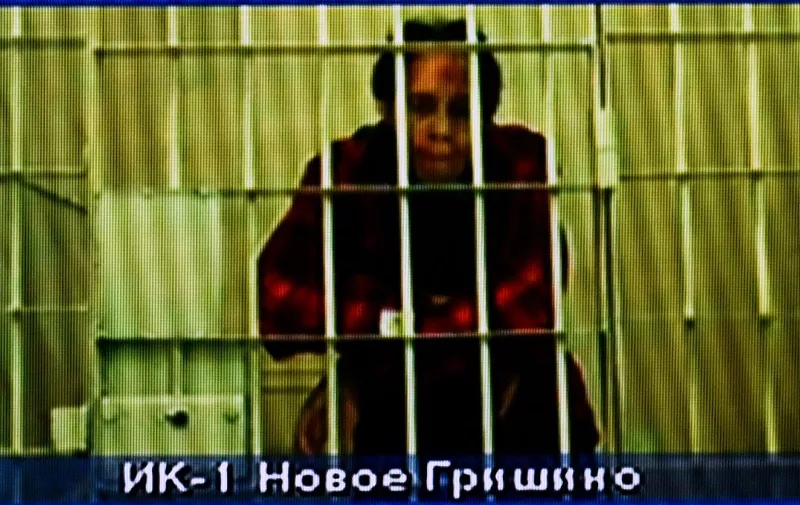 US basketball player Brittney Griner, who was sentenced to nine years in a Russian penal colony in August for drug smuggling, is seen on a screen via a video link from a remand prison before a court hearing to consider an appeal against her sentence, at the Moscow regional court on October 25, 2022. - The two-time Olympic basketball gold medallist and Women's NBA champion was detained at a Moscow airport in February after she was found carrying vape cartridges with cannabis oil in her luggage. (Photo by Kirill KUDRYAVTSEV / AFP)