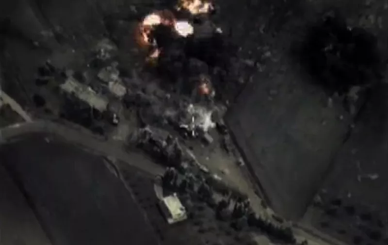 A video grab made on September 30, 2015, shows an image taken footage made available on the Russian Defence Ministry's official website, purporting to show an airstrike in Syria.  Russia launched air strikes in war-torn Syria, its first military engagement outside the former Soviet Union since the occupation of Afghanistan in 1979.  Russian warplanes carried out strikes in three Syrian provinces along with regime aircraft as Putin seeks to steal US President Barack Obama's thunder by pushing a rival plan to defeat Islamic State militants in Syria.  AFP PHOTO / RUSSIAN DEFENCE MINISTRY

 RESTRICTED TO EDITORIAL USE - MANDATORY CREDIT  " AFP PHOTO / Russian Defence Ministry"  -  NO MARKETING NO ADVERTISING CAMPAIGNS   -   DISTRIBUTED AS A SERVICE TO CLIENTS 