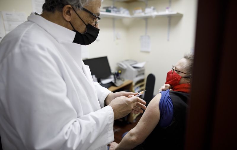 Pharmacist Abraam Rafael administers a COVID-19 vaccine to Maureen Doyle at his pharmacy in Toronto, Sunday, March 14, 2021 as Ontario starts administering the AstraZeneca vaccine for COVID-19 to residents aged 60-64.
Covid Ont, Brantford, Canada - 14 Mar 2021,Image: 597463383, License: Rights-managed, Restrictions: , Model Release: no