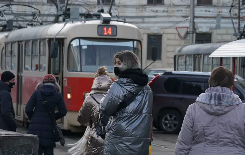 February 4, 2022, Kyiv, Ukraine: People board an electric tram at Kontraktova Square on February 4, 2022 in Kyiv, Ukraine.,Image: 659232709, License: Rights-managed, Restrictions: , Model Release: no, Credit line: Profimedia